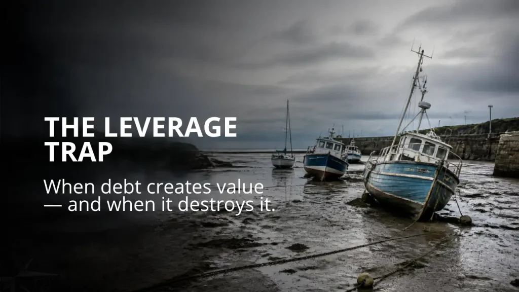 Private equity team reviewing the debt structure and cash flow of a leveraged buyout
